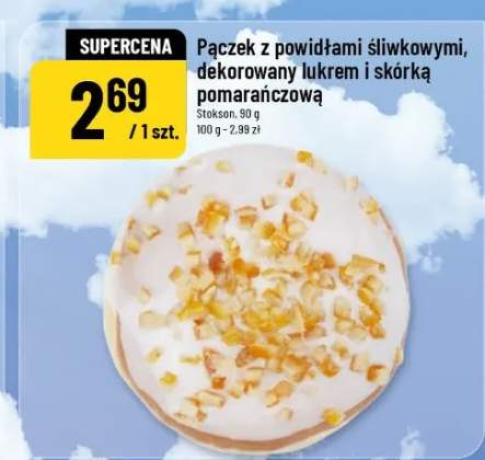 Pączek z powidłami śliwkowymi, dekorowany lukrem i skórką pomarańczową